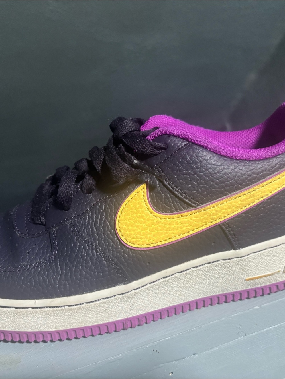Nike Kids Black Leather Sneaker with Yellow Swoosh and Purple Lining